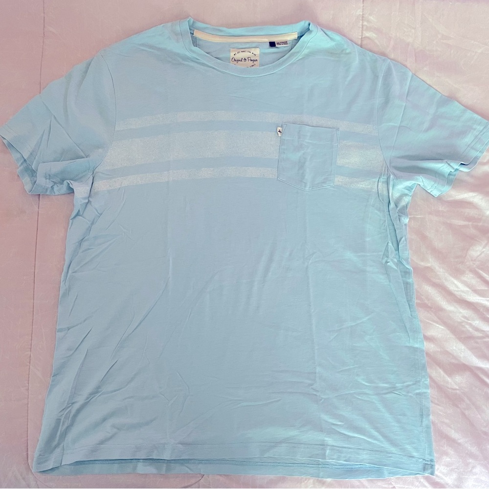 Original Penguin Light Blue with Pocket T-Shirt. Faint White Stripe Print.